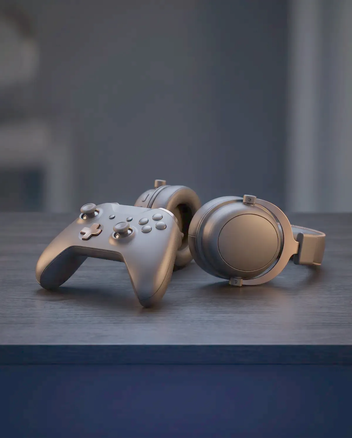 Illustrative photograph of wireless controllers and a headset on a dark desk
